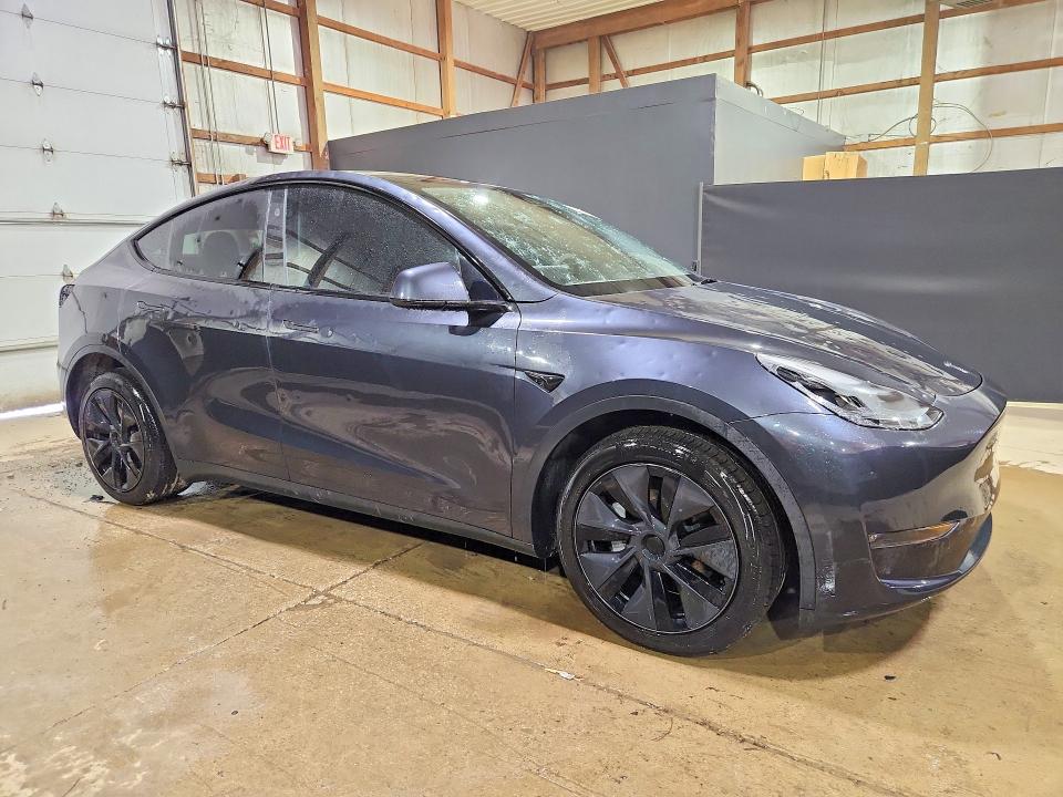 2025 Tesla Model y VIN 7SAYGDEE7SF289184 COPART salvage auction — HAIL, Oh - Certificate Of Title, sold $18,000 on 2026-07-09 (photo 4)