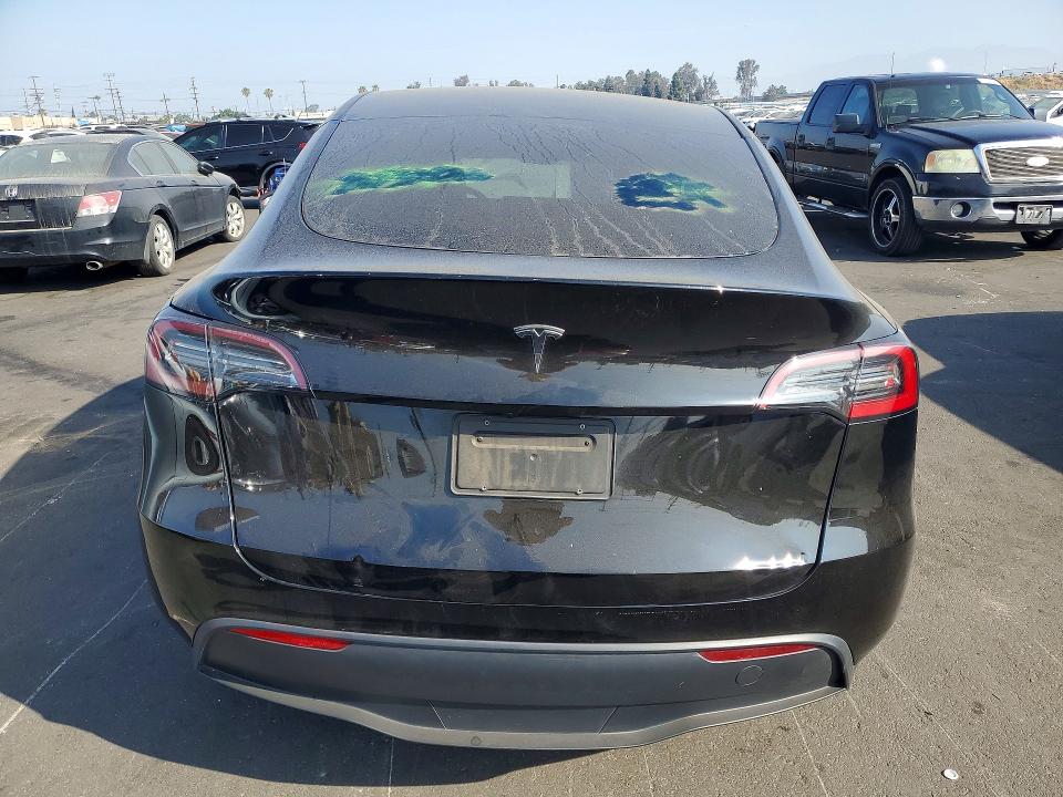 2024 Tesla Model y VIN 7SAYGDED9RF120883 COPART salvage auction — FRONT END, Ca - Salvage Certificate, sold $9,400 on 2026-07-06 (photo 6)