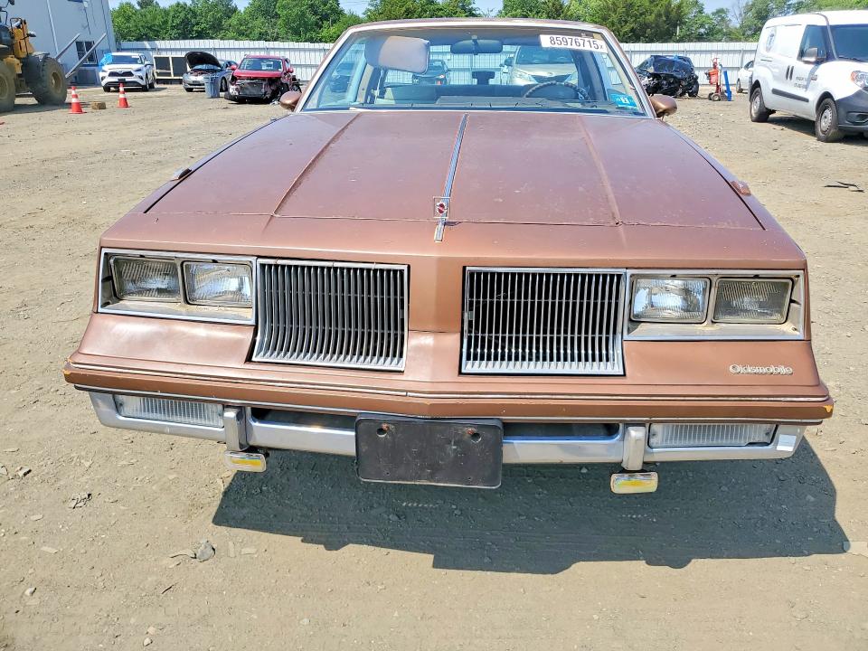 1986 Oldsmobile Cutlass supreme VIN 1G3GM47Y0GP378102 COPART salvage auction — NORMAL WEAR, Nj - Certificate Of Title, sold $4,250 on 2026-07-06 (photo 5)