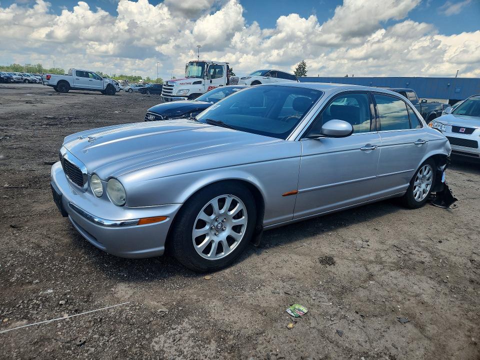 2004 Jaguar Xj series VIN SAJEA71C94SG06738 COPART salvage auction — REAR END, MI - CERTIFICATE OF TITLE, sold $500 on 2026-07-14 (photo 1)