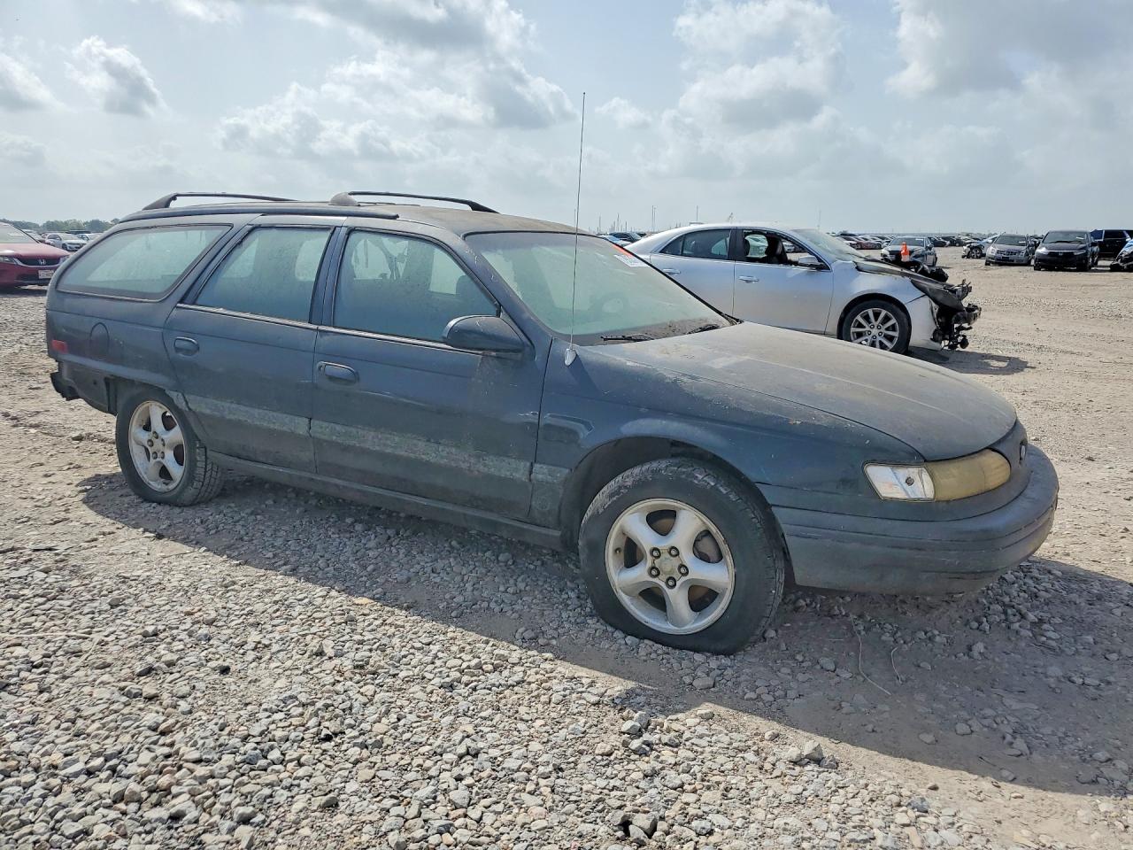 1994 Ford Taurus VIN 1FALP57UXRA217745 COPART salvage auction — Rear End, TX - CERTIFICATE OF TITLE, sold $150 on 2026-07-02 (photo 4)