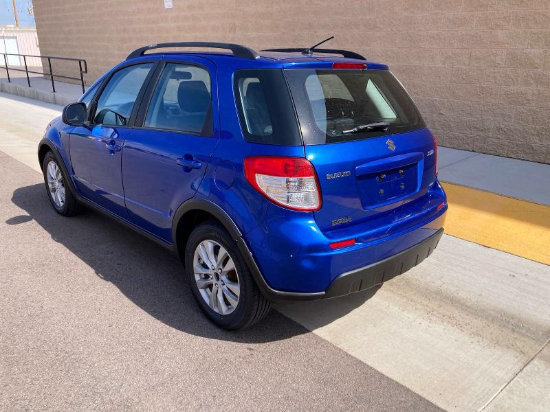 2013 Suzuki Sx4 VIN JS2YB5A31D6101902 COPART salvage auction — DAMAGE HISTORY, Co - Dlr/Dis/Exp-Ct Others-Ca Acq (P), sold $450 on 2026-07-09 (photo 3)