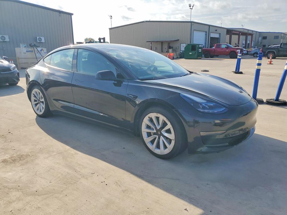2022 Tesla Model 3 VIN 5YJ3E1EA4NF185202 COPART salvage auction — REAR END, TX - CERTIFICATE OF TITLE, sold $7,200 on 2026-07-08 (photo 4)