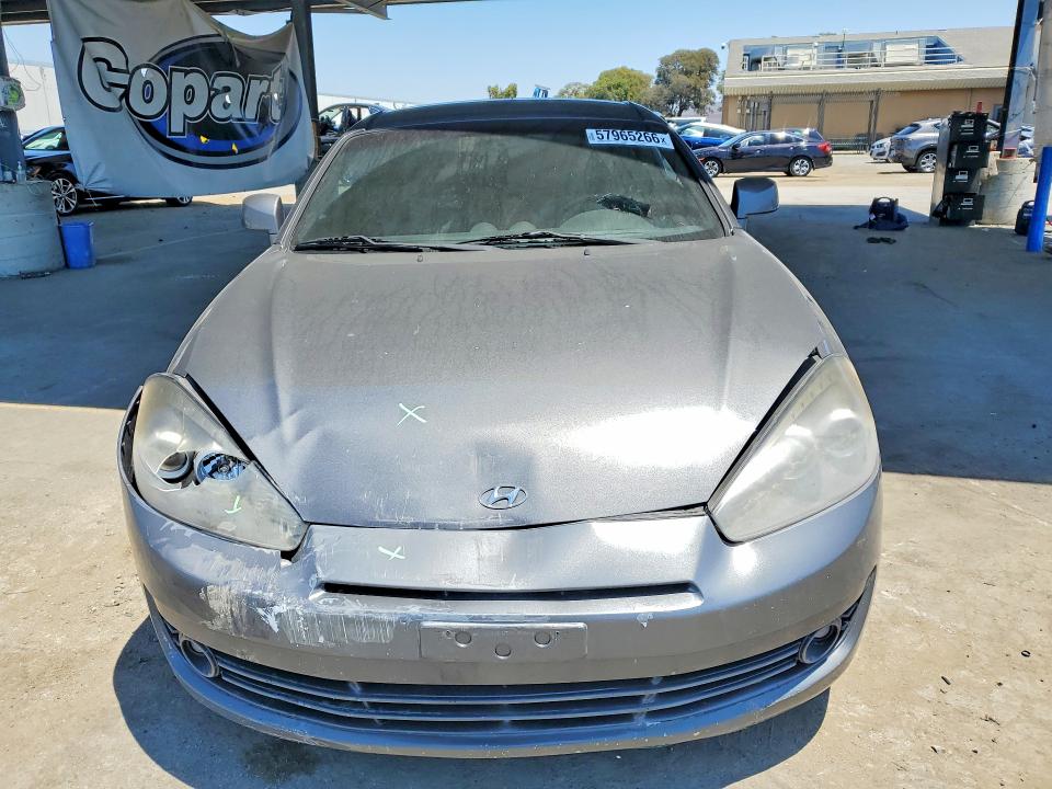 2007 Hyundai Tiburon VIN KMHHN66F77U237425 COPART salvage auction — FRONT END, Ca - Salvage Certificate, sold $150 on 2026-07-30 (photo 5)