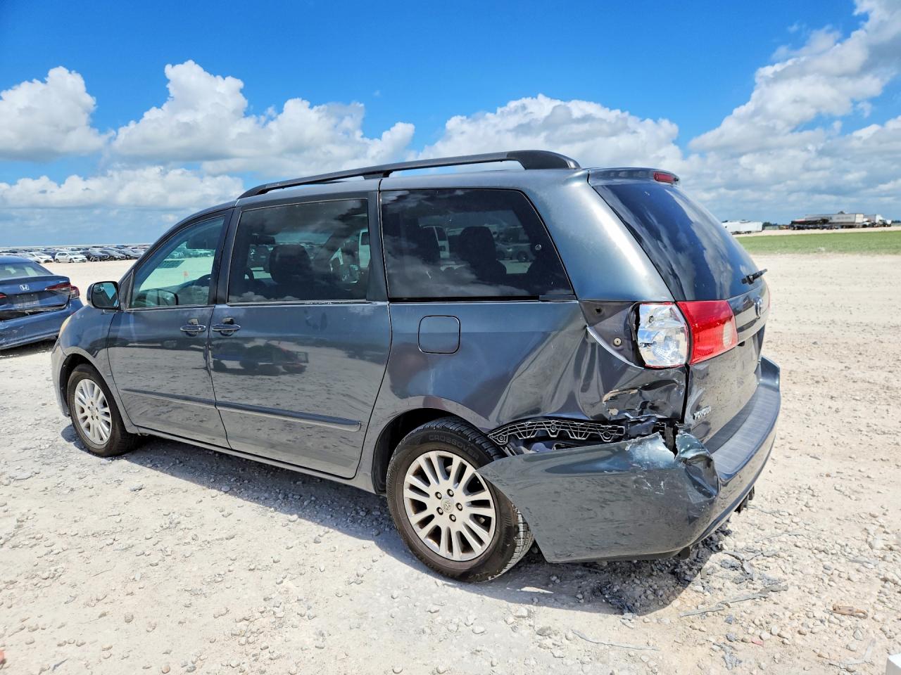 2010 Toyota Sienna VIN 5TDYK4CC5AS299994 COPART salvage auction — Rear End, TX - SALVAGE VEHICLE TITLE, sold $1,700 on 2026-07-09 (photo 2)