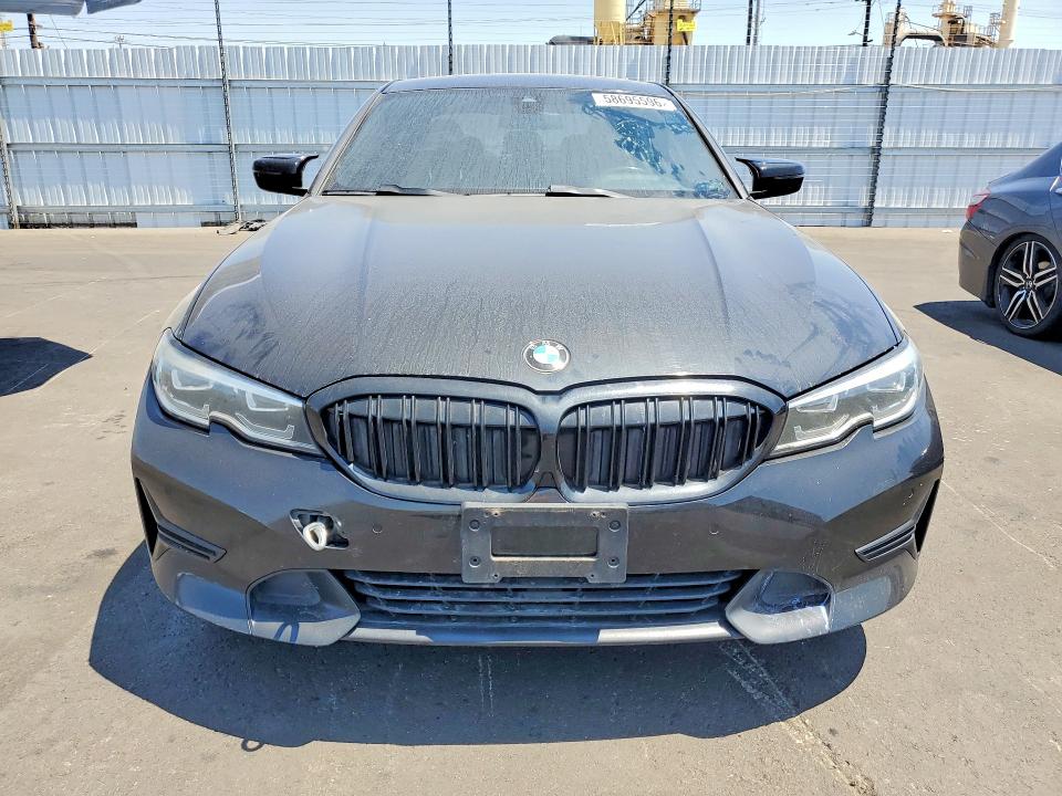 2019 BMW 3 series VIN 3MW5R1J55K8B00662 COPART salvage auction — ENGINE BURN, Wv - Dis/Dlr/Exp Only Clean Title (P), sold $7,300 on 2026-08-03 (photo 5)