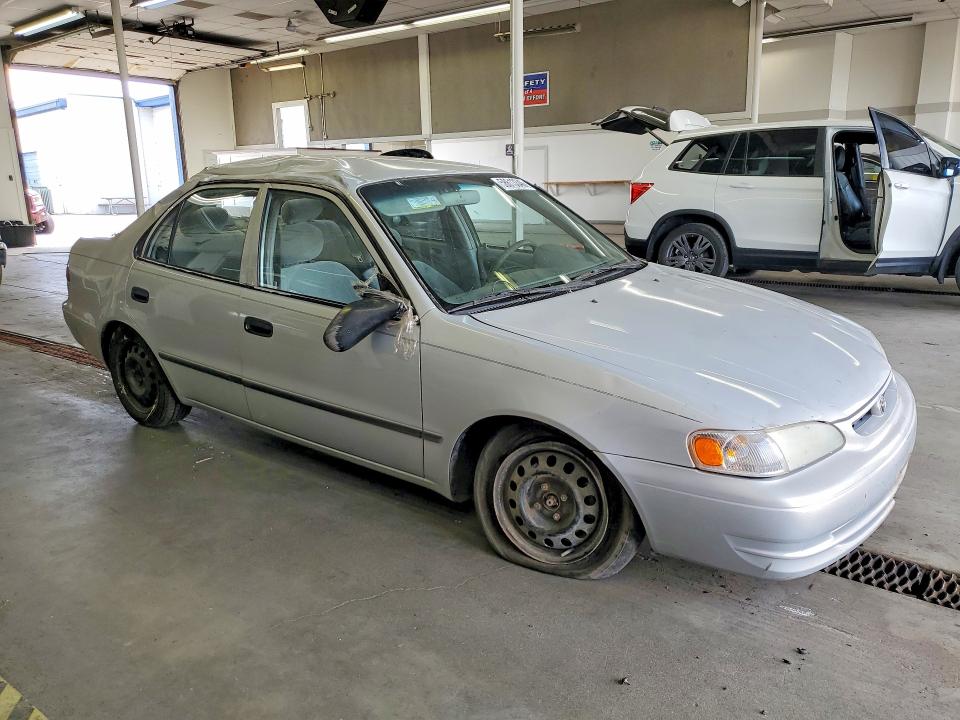 2000 Toyota Corolla VIN 1NXBR12E8YZ407044 COPART salvage auction — ROLLOVER, WA - BILL OF SALE, sold $275 on 2026-07-10 (photo 4)