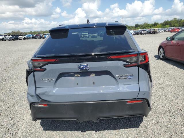 2023 Subaru Solterra VIN JTMABABA8PA018647 COPART salvage auction — SIDE, Fl - Cert Of Title Slvg Rebuildable, sold $12,300 on 2026-07-02 (photo 6)