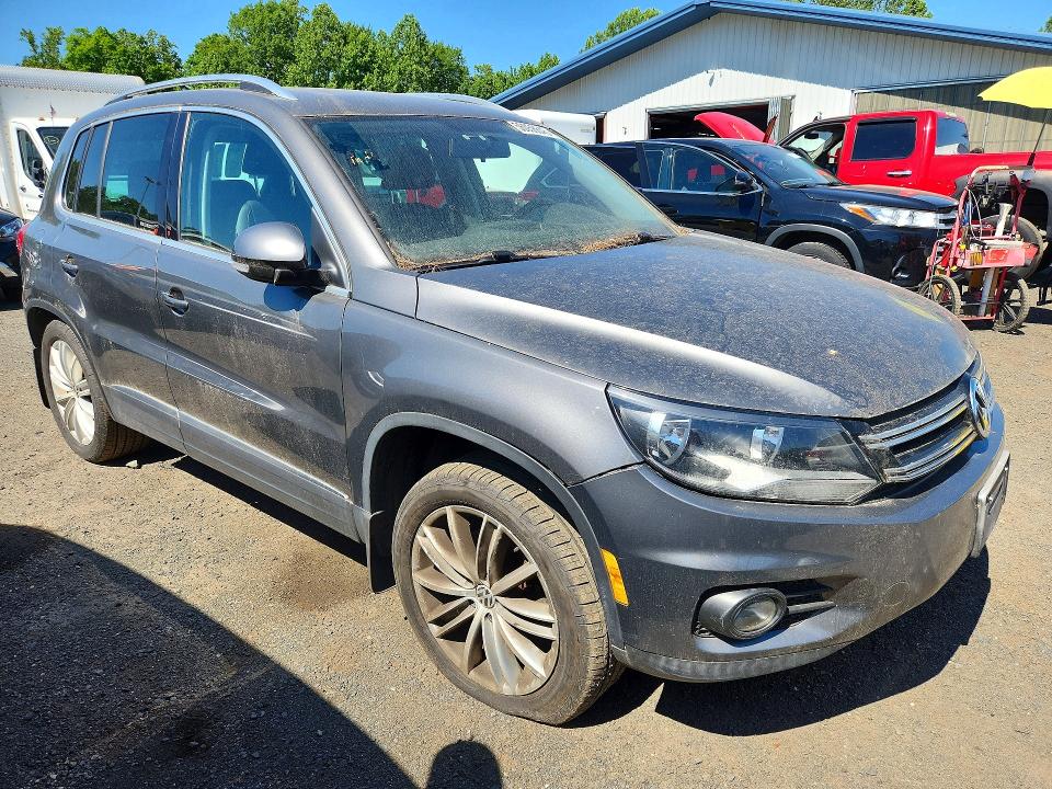 2012 Volkswagen Tiguan VIN WVGBV7AX1CW005705 COPART salvage auction — MINOR DENT/SCRATCHES, Ny - Certificate Of Title, sold $3,500 on 2026-07-09 (photo 4)