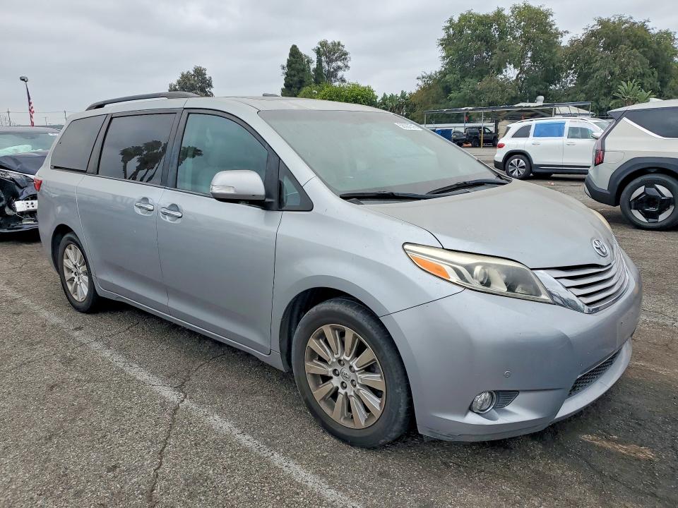 2015 Toyota Sienna VIN 5TDYK3DC6FS648628 COPART salvage auction — SIDE, Ca - Salvage Certificate, sold $6,700 on 2026-07-17 (photo 4)