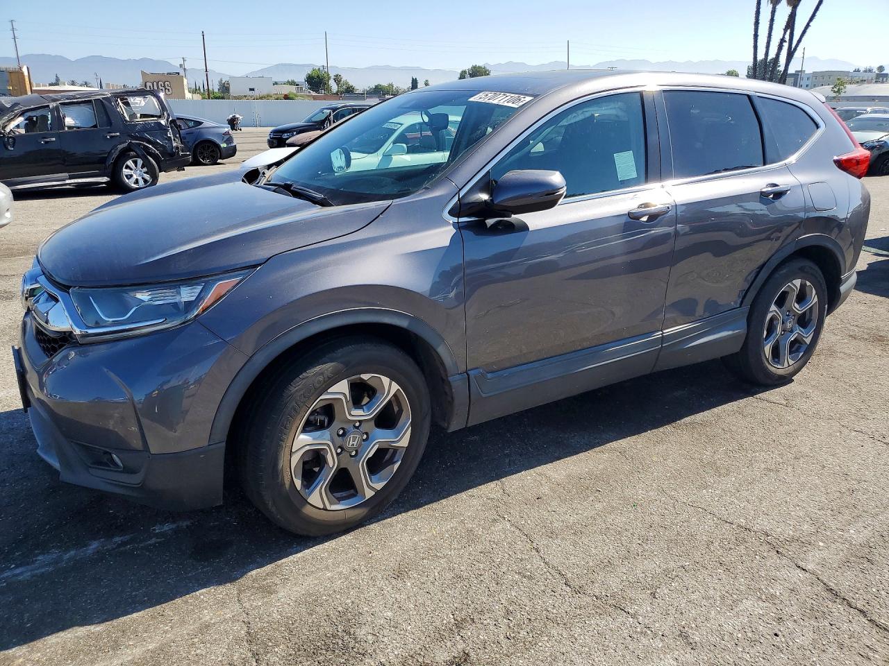 2018 Honda CR-V VIN 2HKRW1H87JH503678 — COPART salvage auction photo