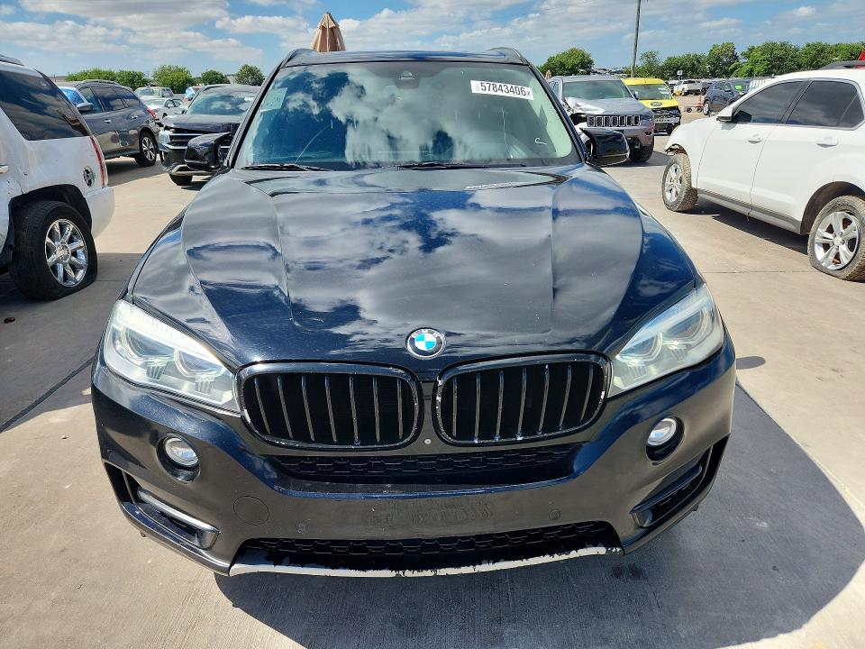 2015 BMW VIN 5UXKR0C58F0P11460 COPART salvage auction — NORMAL WEAR, Tx - Certificate Of Title, sold $4,250 on 2026-07-09 (photo 5)