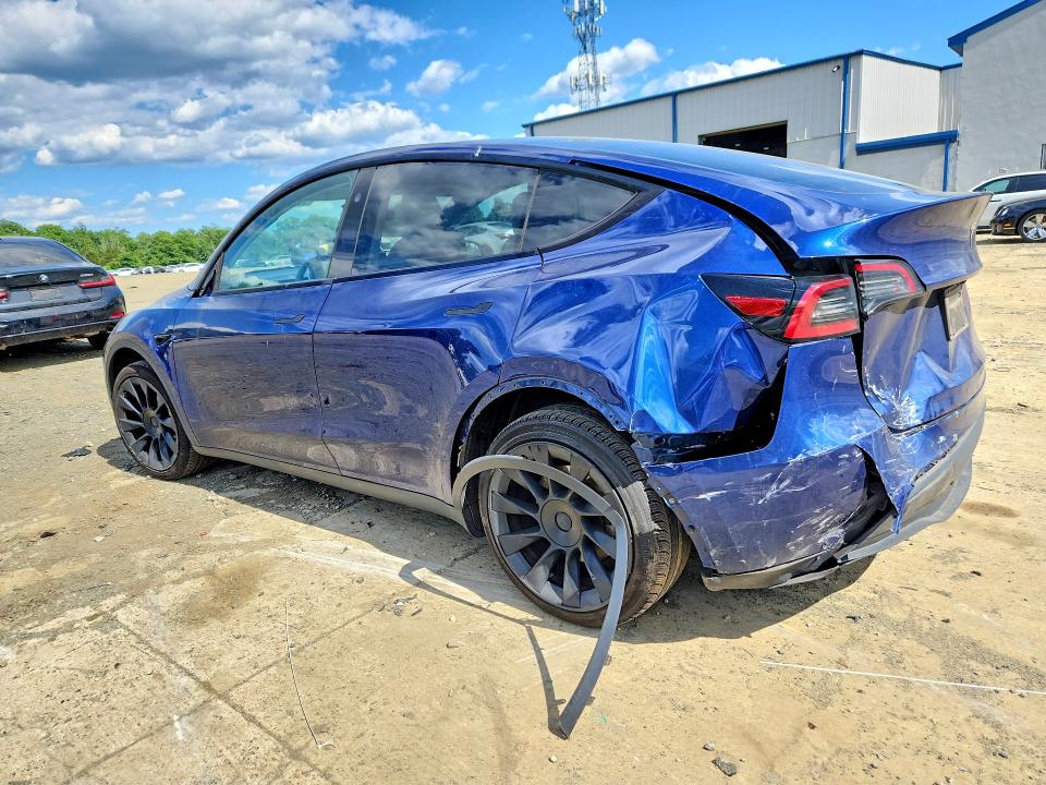 2023 Tesla VIN 7SAYGDEE4PA171002 COPART salvage auction — REAR END, Nj - Cert Of Title-Salvage, sold $10,200 on 2026-07-29 (photo 2)