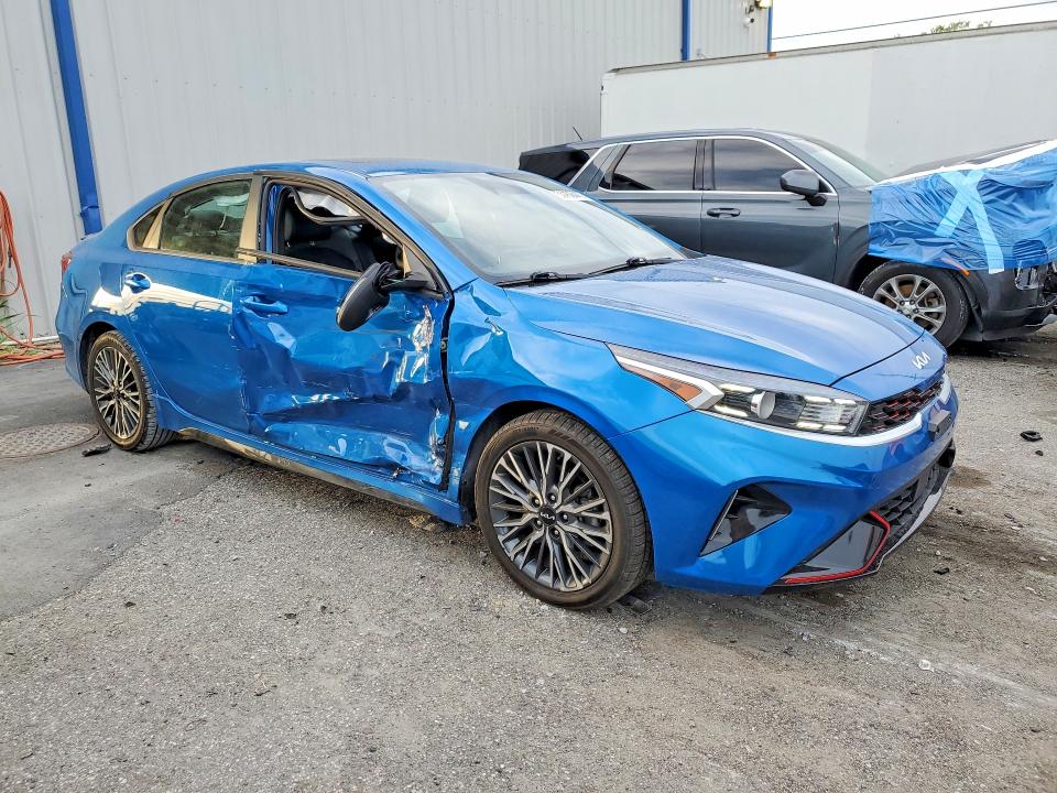 2023 Kia VIN 3KPF54AD4PE552901 COPART salvage auction — SIDE, Fl - Certificate Of Destruction, sold $4,750 on 2026-07-31 (photo 4)