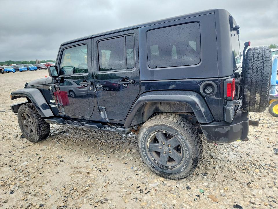 2009 Jeep Wrangler unlimited VIN 1J4GA59129L751093 COPART salvage auction — ENGINE BURN, Mi - Certificate Of Title, sold $725 on 2026-07-09 (photo 2)