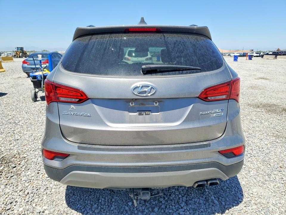 2017 Hyundai Santa fe VIN 5XYZUDLA8HG489910 COPART salvage auction — NORMAL WEAR, MI - DIS/DLR/EXP ONLY CLEAN TITLE, sold $2,650 on 2026-07-09 (photo 6)