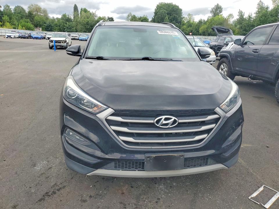 2018 Hyundai Tucson VIN KM8J3CA28JU792076 COPART salvage auction — NORMAL WEAR, Or - Certificate Of Title, sold $2,000 on 2026-07-27 (photo 5)