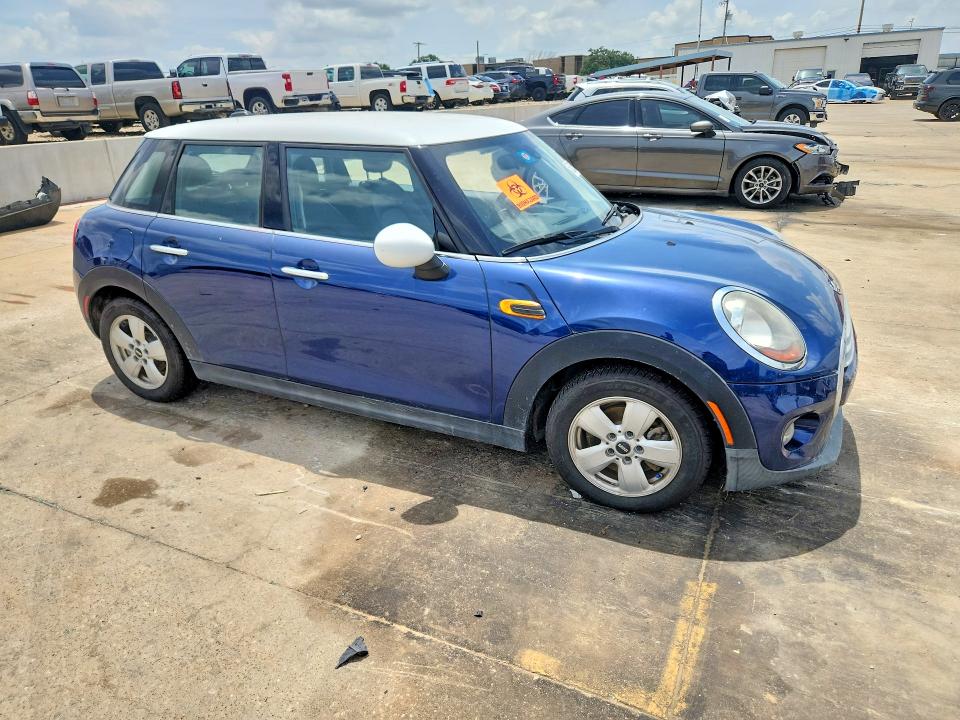 2015 Mini VIN WMWXS5C50FT830950 COPART salvage auction — WATER/FLOOD, Tx - Salvage Title-Flood Damage, sold $525 on 2026-07-16 (photo 4)