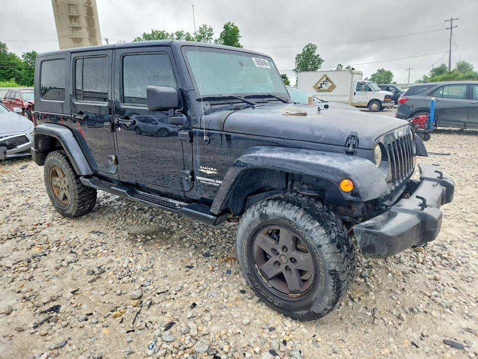 2009 Jeep Wrangler unlimited VIN 1J4GA59129L751093 COPART salvage auction — ENGINE BURN, Mi - Certificate Of Title, sold $725 on 2026-07-09 (photo 4)