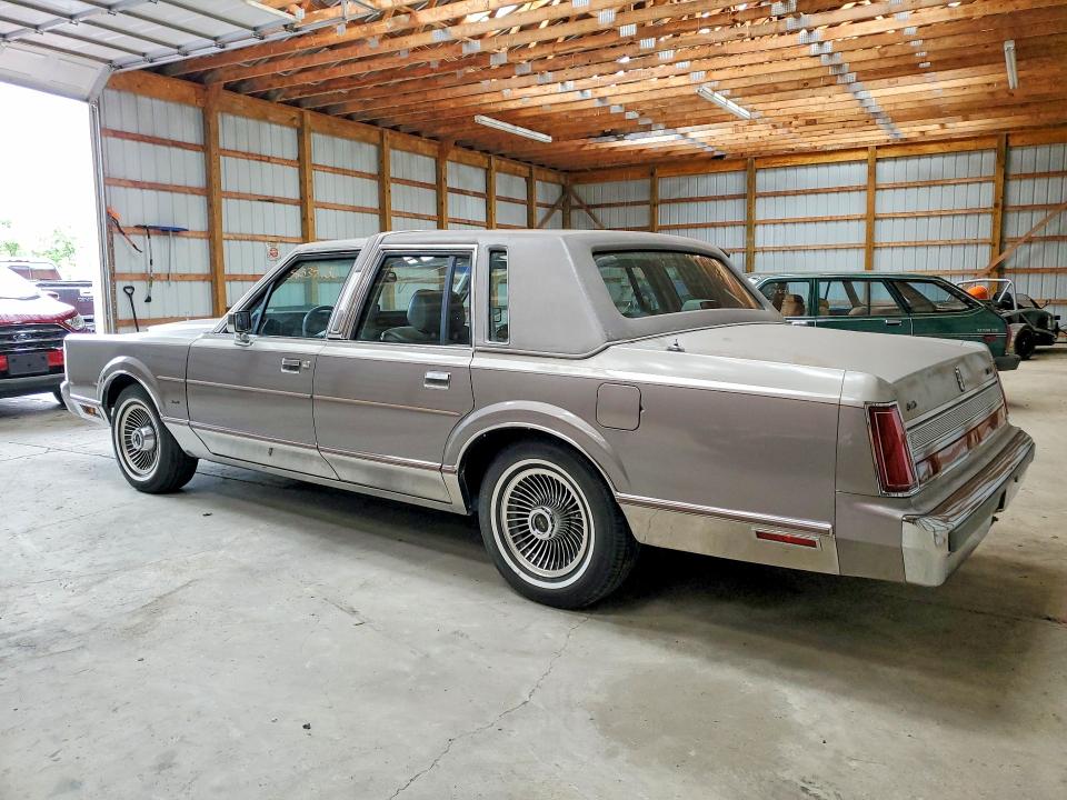 1989 Lincoln TOWN CAR VIN 1LNBM83F7KY627418 COPART salvage auction — BURN, Ny - Mv-907A Salvage Certificate (P), sold $4,400 on 2026-07-28 (photo 2)
