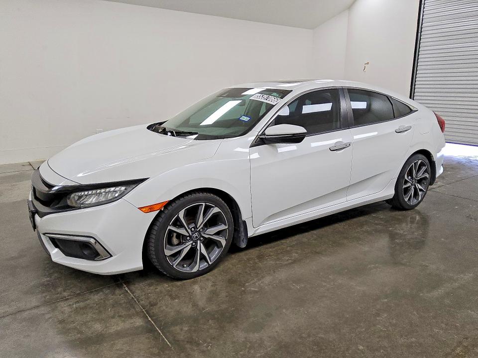 2020 Honda Civic VIN 19XFC1F96LE020729 COPART salvage auction — MINOR DENT/SCRATCHES, Tx - Certificate Of Title, sold $15,000 on 2026-07-09 (photo 1)