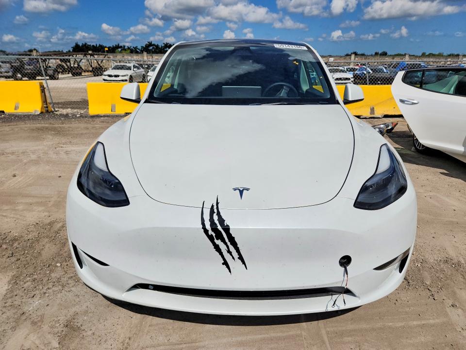 2024 Tesla Model y VIN 7SAYGDED0RF041831 COPART salvage auction — REAR END, Fl - Cert Of Title Slvg Rebuildable, sold $7,700 on 2026-07-15 (photo 5)