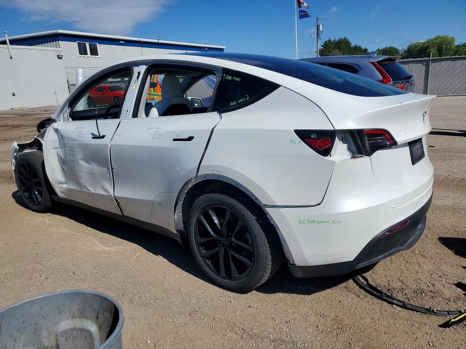 2021 Tesla Model y VIN 5YJYGAEE4MF189669 COPART salvage auction — SIDE, On - Permit No Brand - Unfit, sold $11,500 on 2026-07-09 (photo 2)