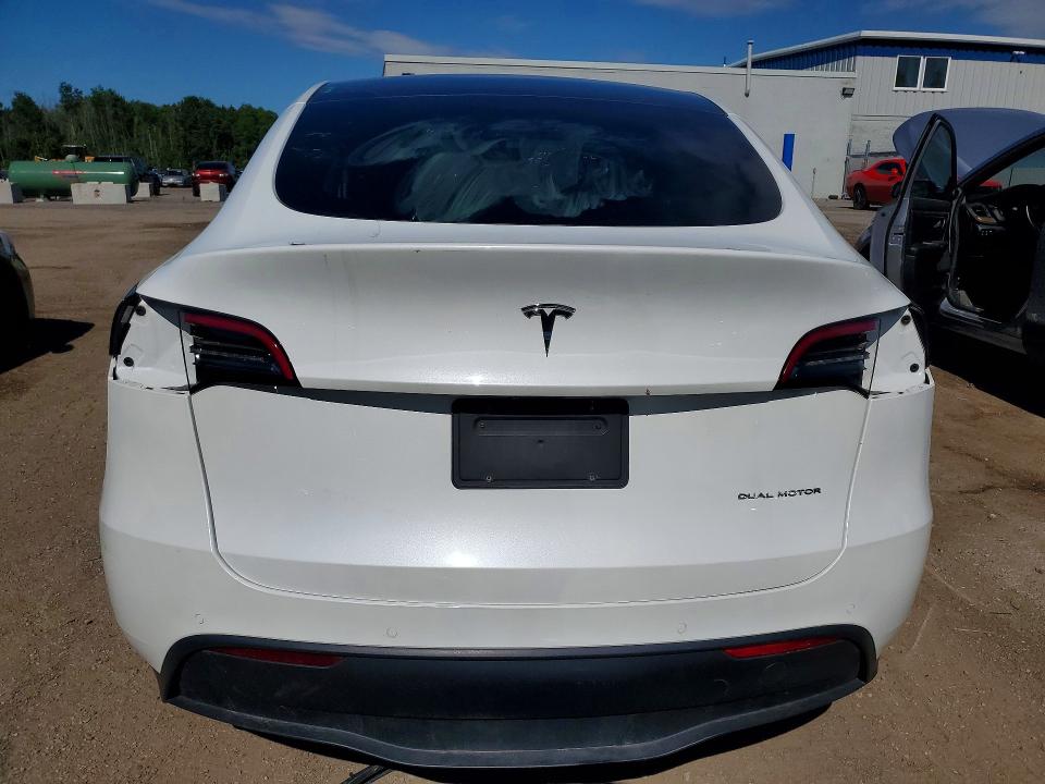2021 Tesla Model y VIN 5YJYGAEE4MF189669 COPART salvage auction — SIDE, On - Permit No Brand - Unfit, sold $11,500 on 2026-07-09 (photo 6)