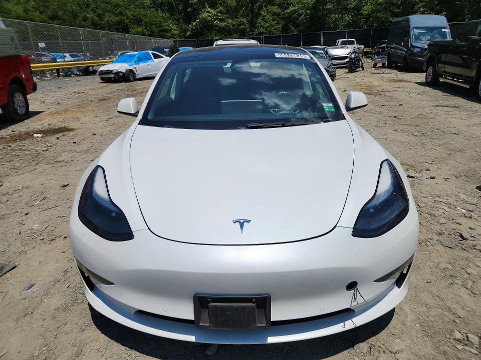 2022 Tesla Model 3 VIN 5YJ3E1EA0NF369441 COPART salvage auction — SIDE, Va - Certificate Of Title, sold $9,000 on 2026-07-08 (photo 5)