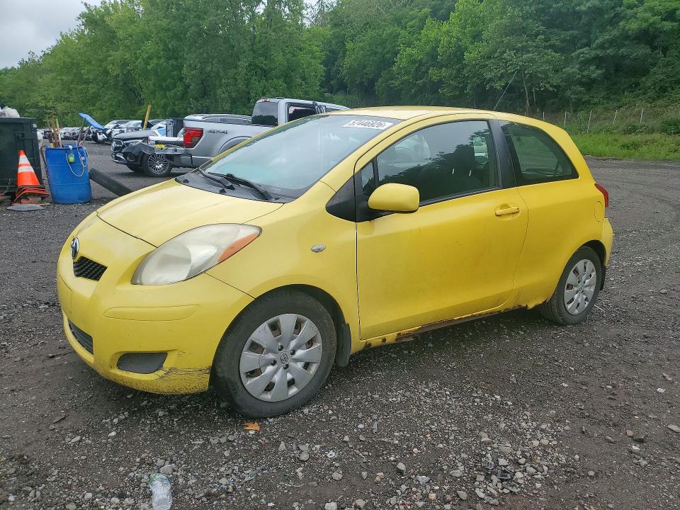 2009 Toyota Yaris VIN JTDJT903X95250243 — COPART salvage auction photo