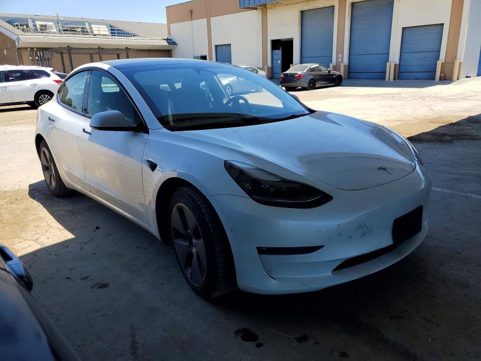 2023 Tesla VIN 5YJ3E1EB8PF388444 COPART salvage auction — REAR END, CA - SALVAGE CERTIFICATE, sold $8,500 on 2026-07-02 (photo 4)