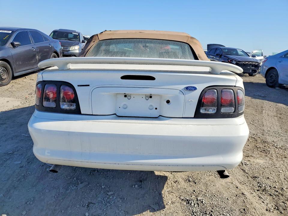 1997 Ford Mustang VIN 1FALP45X0VF153588 COPART salvage auction — MINOR DENT/SCRATCHES, Fl - Cert Of Title-Rebuildable Slvg, sold $475 on 2026-07-02 (photo 6)