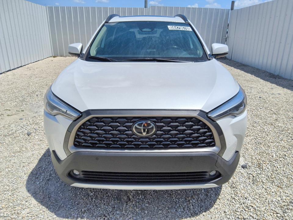 2023 Toyota Corolla cross VIN 7MUDAAAG4PV058951 COPART salvage auction — SIDE, NC - CERTIFICATE OF TITLE, sold $19,500 on 2026-07-14 (photo 5)