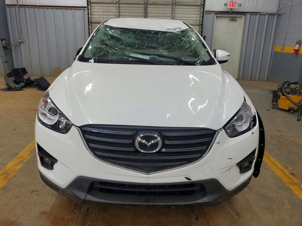2016 Mazda Cx-5 VIN JM3KE2CY0G0843897 COPART salvage auction — ROLLOVER, Nc - Salvage Certificate Of Title, sold $175 on 2026-07-29 (photo 5)