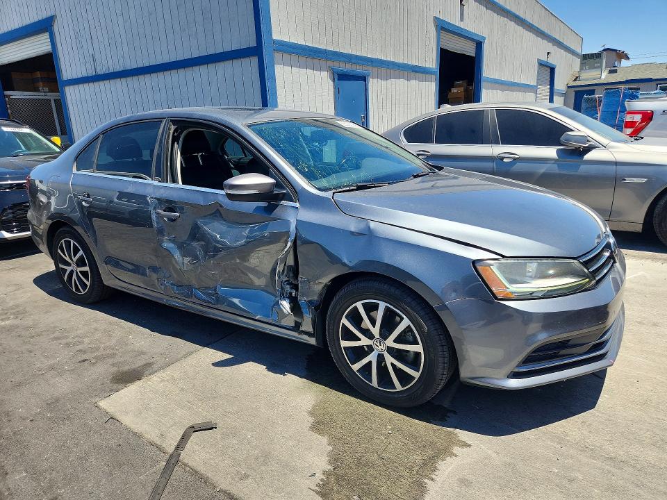 2017 Volkswagen Jetta VIN 3VWDB7AJXHM220814 COPART salvage auction — SIDE, Nv - Salvage Title, sold $1,100 on 2026-07-27 (photo 4)