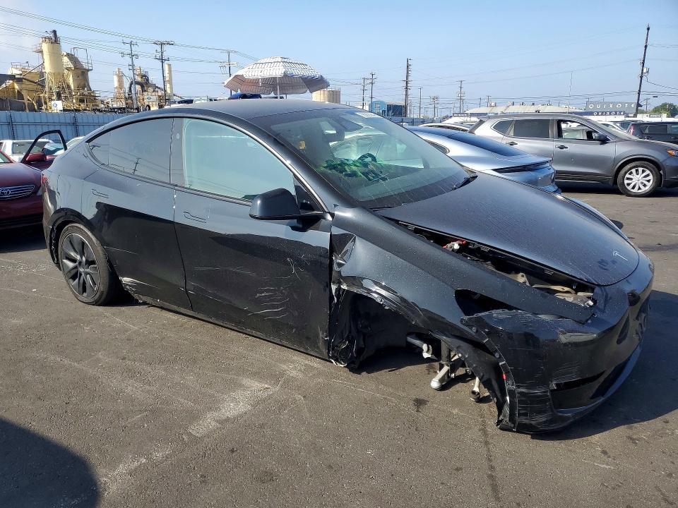 2024 Tesla Model y VIN 7SAYGDED9RF120883 COPART salvage auction — FRONT END, Ca - Salvage Certificate, sold $9,400 on 2026-07-06 (photo 4)