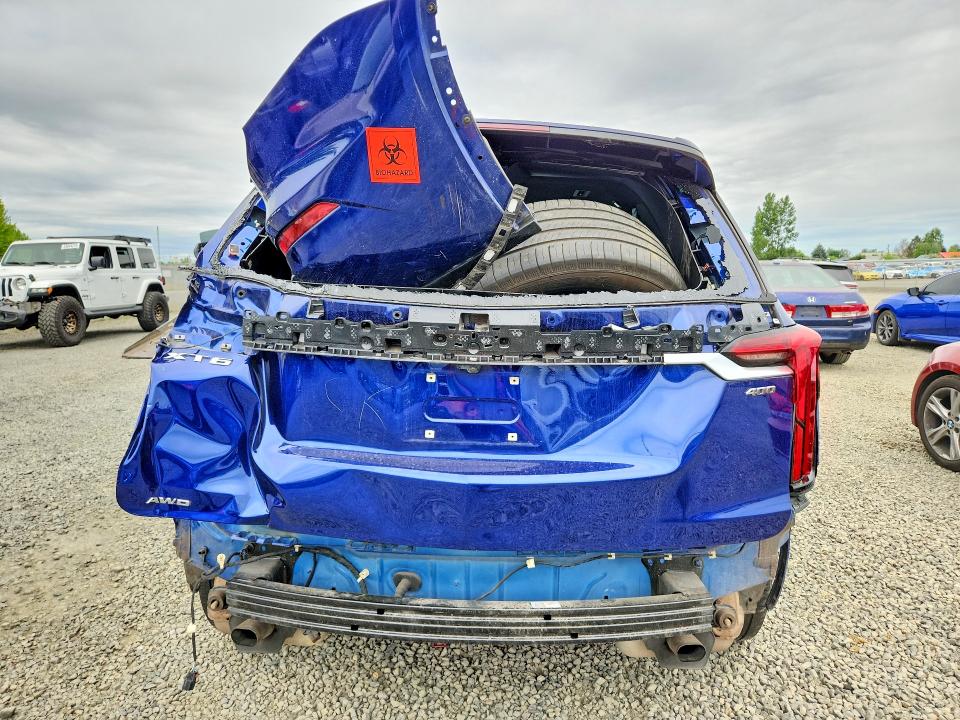 2025 Cadillac Xt6 VIN 1GYKPDRS9SZ119433 COPART salvage auction — ROLLOVER, Or - Salvage Title Certificate, sold $250 on 2026-07-21 (photo 6)