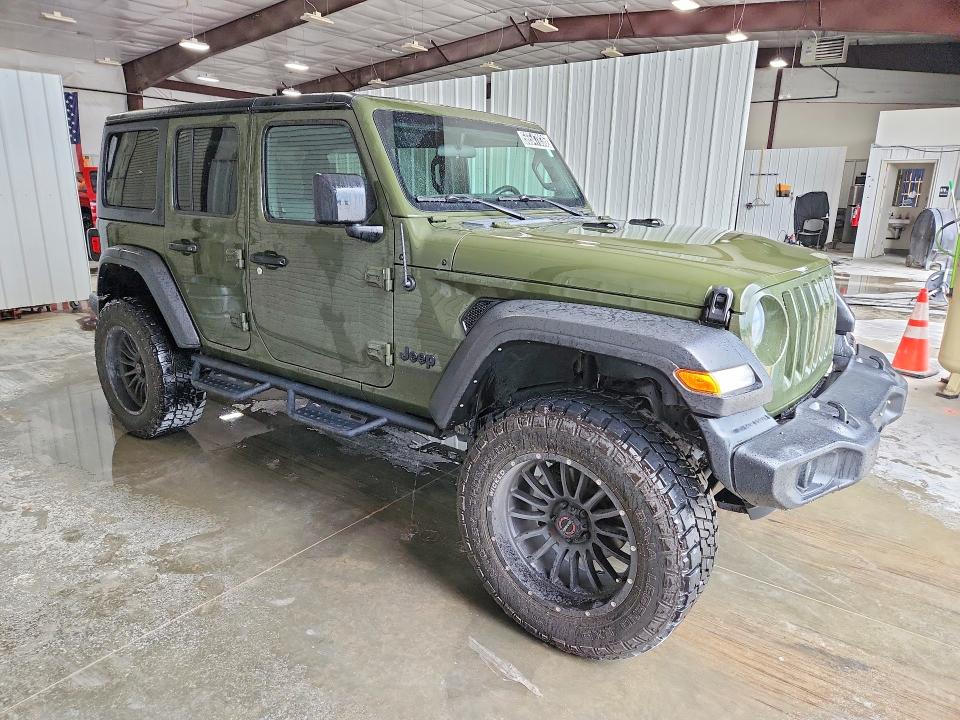 2022 Jeep Wrangler unlimited VIN 1C4HJXDG7NW165533 COPART salvage auction — NORMAL WEAR, IL - CERTIFICATE OF TITLE, sold $23,000 on 2026-07-16 (photo 4)