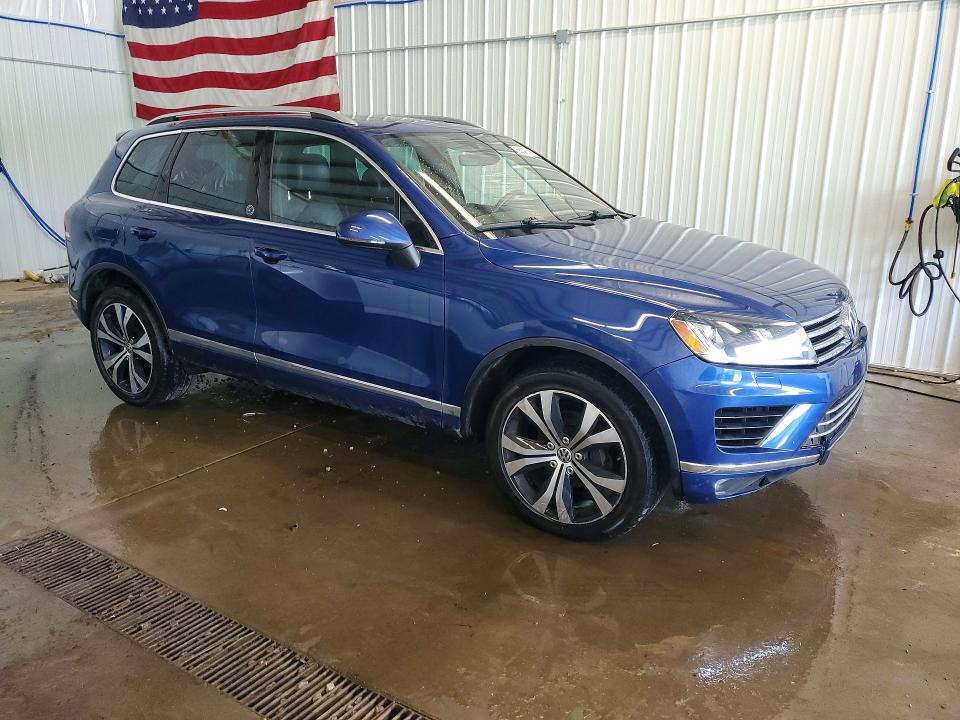 2017 Volkswagen Touareg VIN WVGRF7BP9HD004105 COPART salvage auction — MECHANICAL, Wv - Certificate Of Title, sold $1,400 on 2026-07-11 (photo 4)