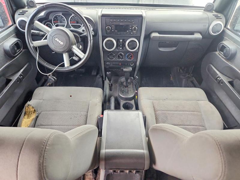 2009 Jeep Wrangler unlimited VIN 1J4GA59129L751093 COPART salvage auction — ENGINE BURN, Mi - Certificate Of Title, sold $725 on 2026-07-09 (photo 8)