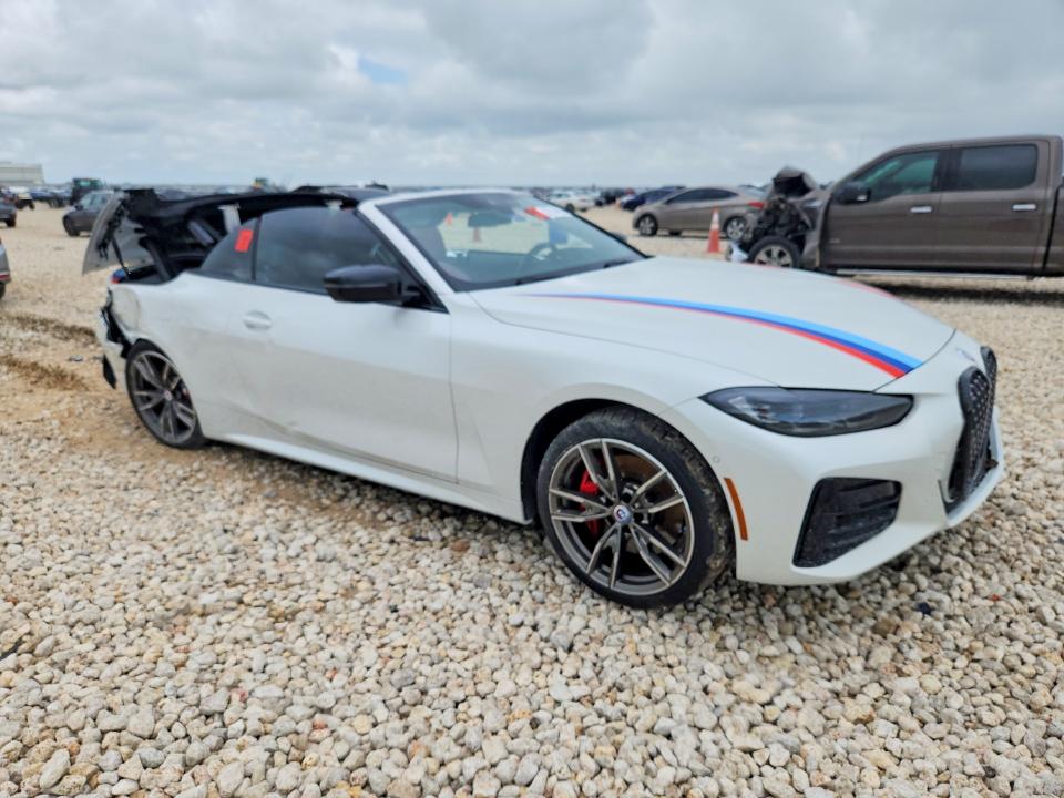 2023 BMW VIN WBA53AT03PCM84587 COPART salvage auction — UNDERCARRIAGE, TX - SALVAGE VEHICLE TITLE (P), sold $9,000 on 2026-07-23 (photo 4)