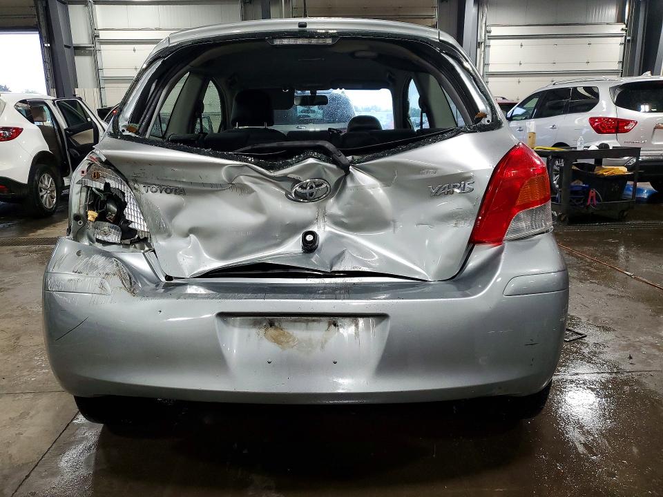 2009 Toyota Yaris VIN JTDJT903095255984 COPART salvage auction — REAR END, Mn - Cert Of Title-Prior Salvage, sold $250 on 2026-07-28 (photo 6)