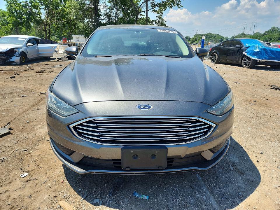 2017 Ford Fusion VIN 3FA6P0HD4HR189301 COPART salvage auction — MINOR DENT/SCRATCHES, Md - Certificate Of Title, sold $1,000 on 2026-07-28 (photo 5)