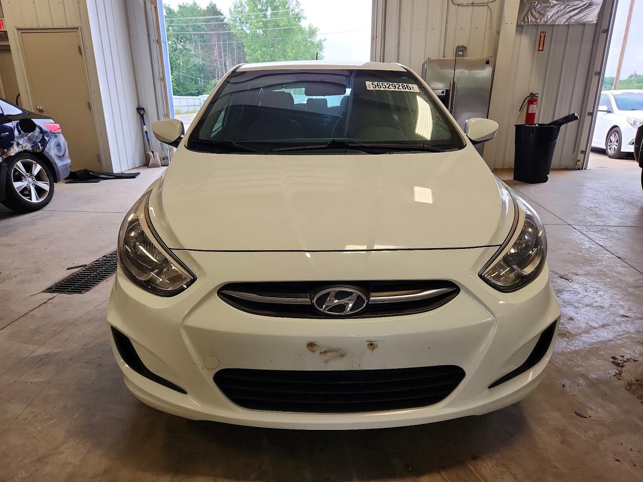 2016 Hyundai Accent VIN KMHCT5AEXGU241350 COPART salvage auction — Rear End, MN - CERT OF TITLE-PR SALV FLOOD, sold $725 on 2026-07-07 (photo 5)