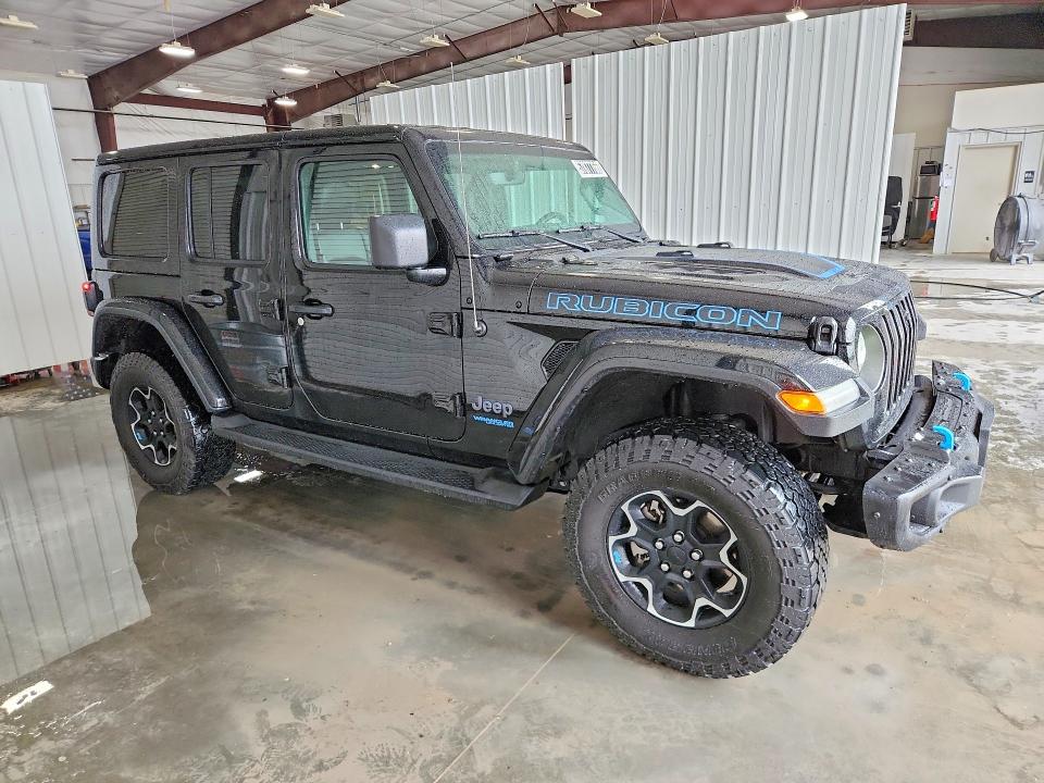 2022 Jeep Wrangler unlimited VIN 1C4JJXR65NW178654 COPART salvage auction — NORMAL WEAR, IL - CERTIFICATE OF TITLE, sold $19,900 on 2026-07-16 (photo 4)