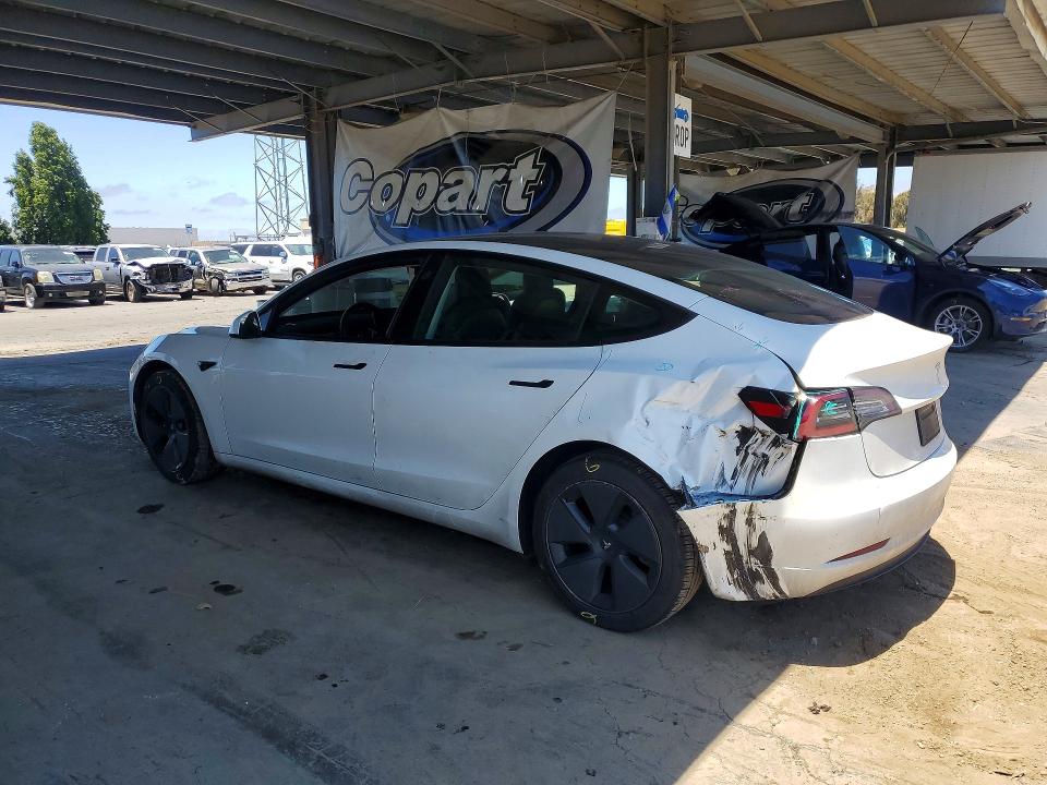 2023 Tesla VIN 5YJ3E1EB8PF388444 COPART salvage auction — REAR END, CA - SALVAGE CERTIFICATE, sold $8,500 on 2026-07-02 (photo 2)
