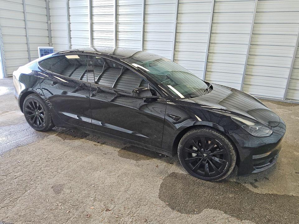 2023 Tesla Model 3 VIN 5YJ3E1EA5PF449191 COPART salvage auction — MINOR DENT/SCRATCHES, Fl - Certificate Of Title (P), sold $8,900 on 2026-07-07 (photo 4)
