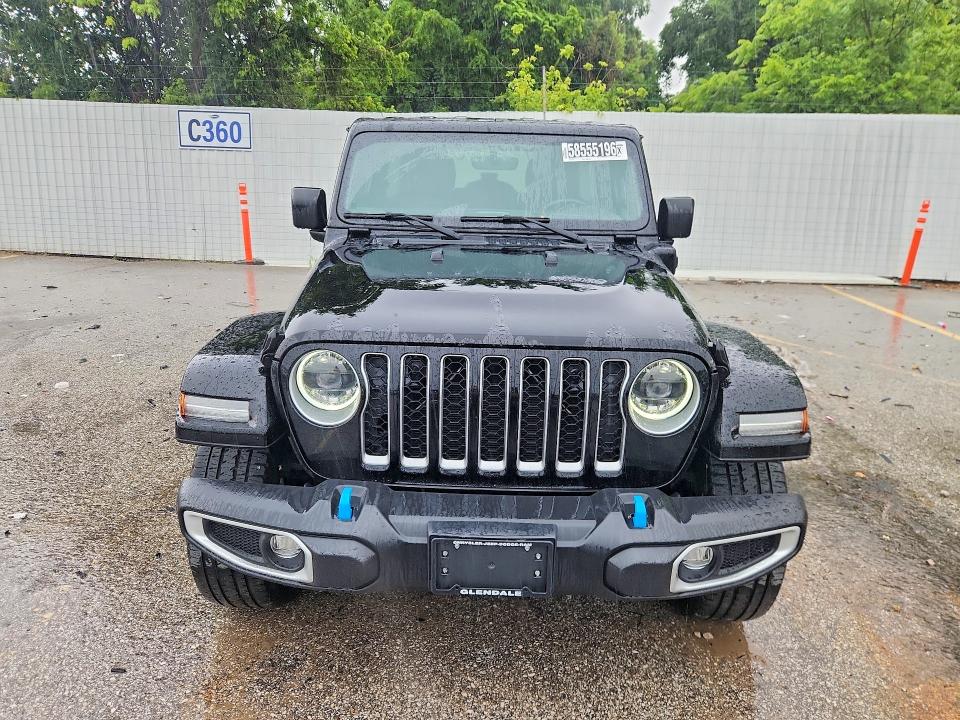 2023 Jeep Wrangler / VIN 1C4JJXP65PW557062 COPART salvage auction — MINOR DENT/SCRATCHES, MO - CERTIFICATE OF TITLE, sold $21,000 on 2026-07-09 (photo 5)