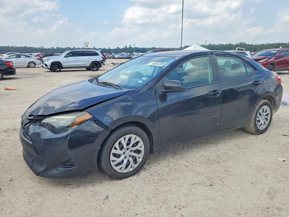 2018 Toyota Corolla VIN 5YFBURHE4JP810594 COPART salvage auction — WATER/FLOOD, Tx - Salvage Title-Flood Damage, sold $3,650 on 2026-07-02 (photo 1)