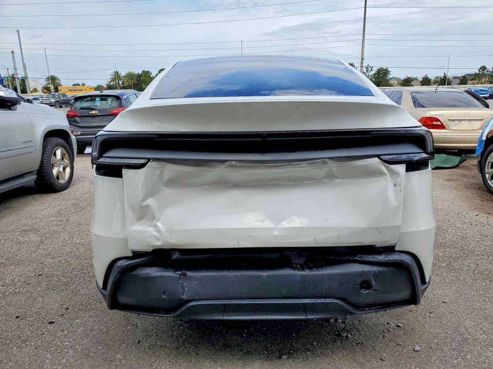 2026 Tesla Model y VIN 7SAYGDED3TA651775 COPART salvage auction — REAR END, FL - CERT OF TITLE SLVG REBUILDABLE, sold $90 on 2026-07-31 (photo 6)
